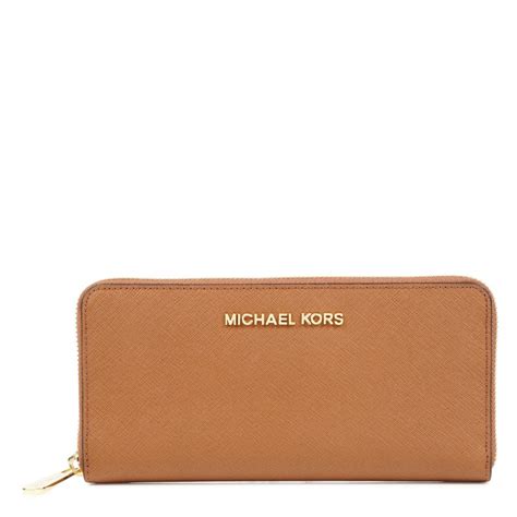 michael kors saffiano wallet brown|Michael Kors travel continental wallet.